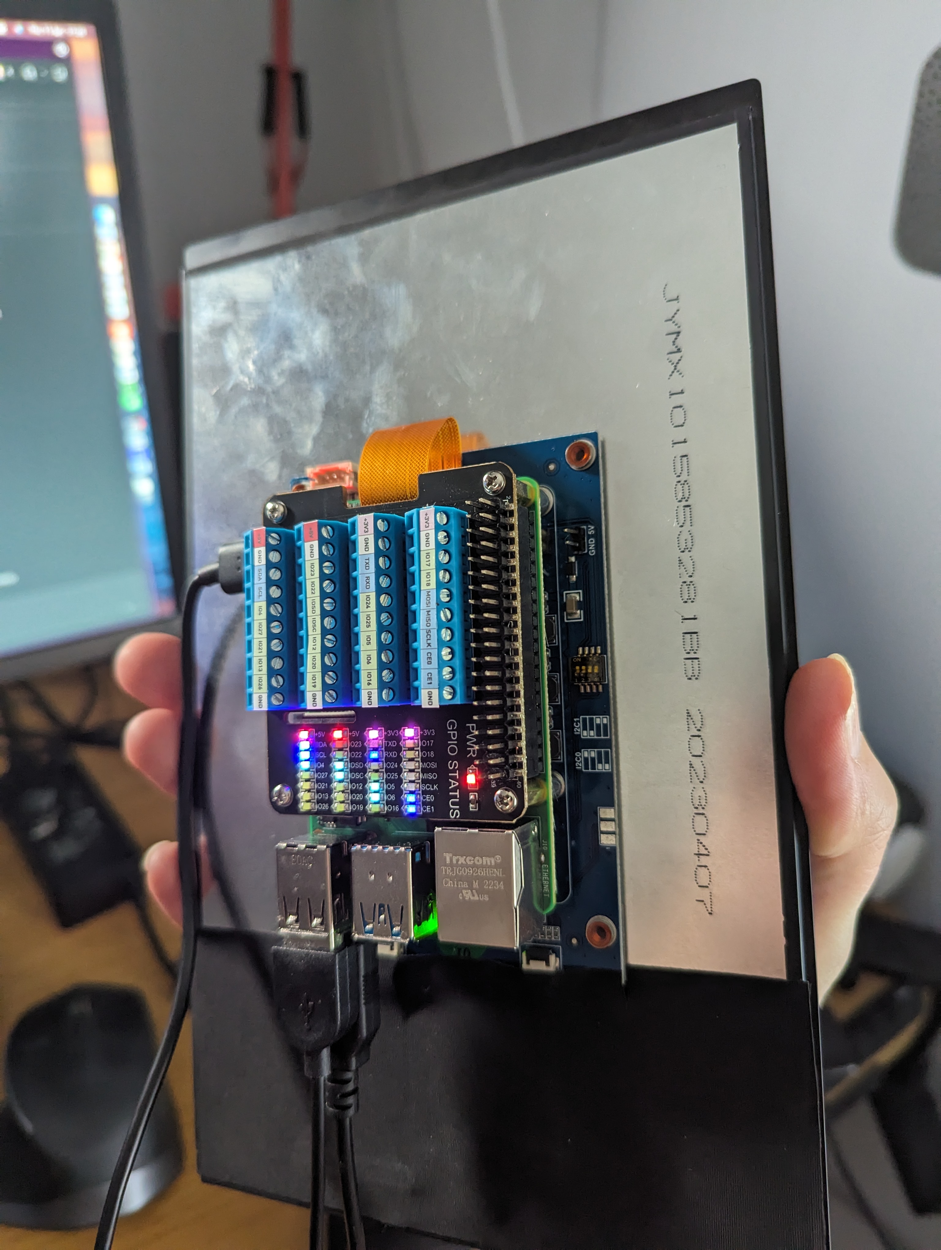 Image of back of screen showing GPIO board mounted to back of the pi